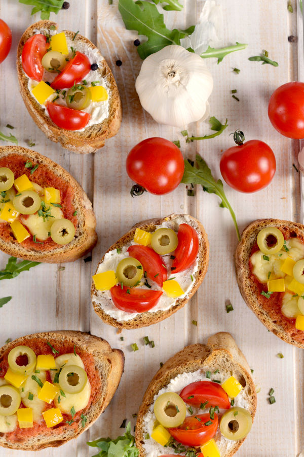 Appetizer Recipe: Cheesy Bruschetta with Tomatoes, Olives, & Peppers