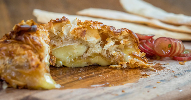 Apricot And Caramelized Onion-Stuffed Baked Brie