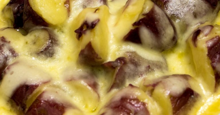 Cheesy Smothered Sweet Potatoes