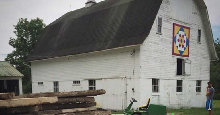 Family Converts 80-Year-Old Barn Into A Modern Farmhouse With An Exposed Interior Roof Frame