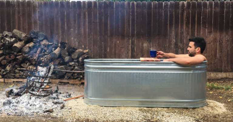 How To Make A DIY Wood-Fired Stock Tank Hot Tub