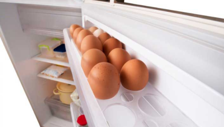 Why You Shouldn’t Keep Eggs In Your Fridge Door