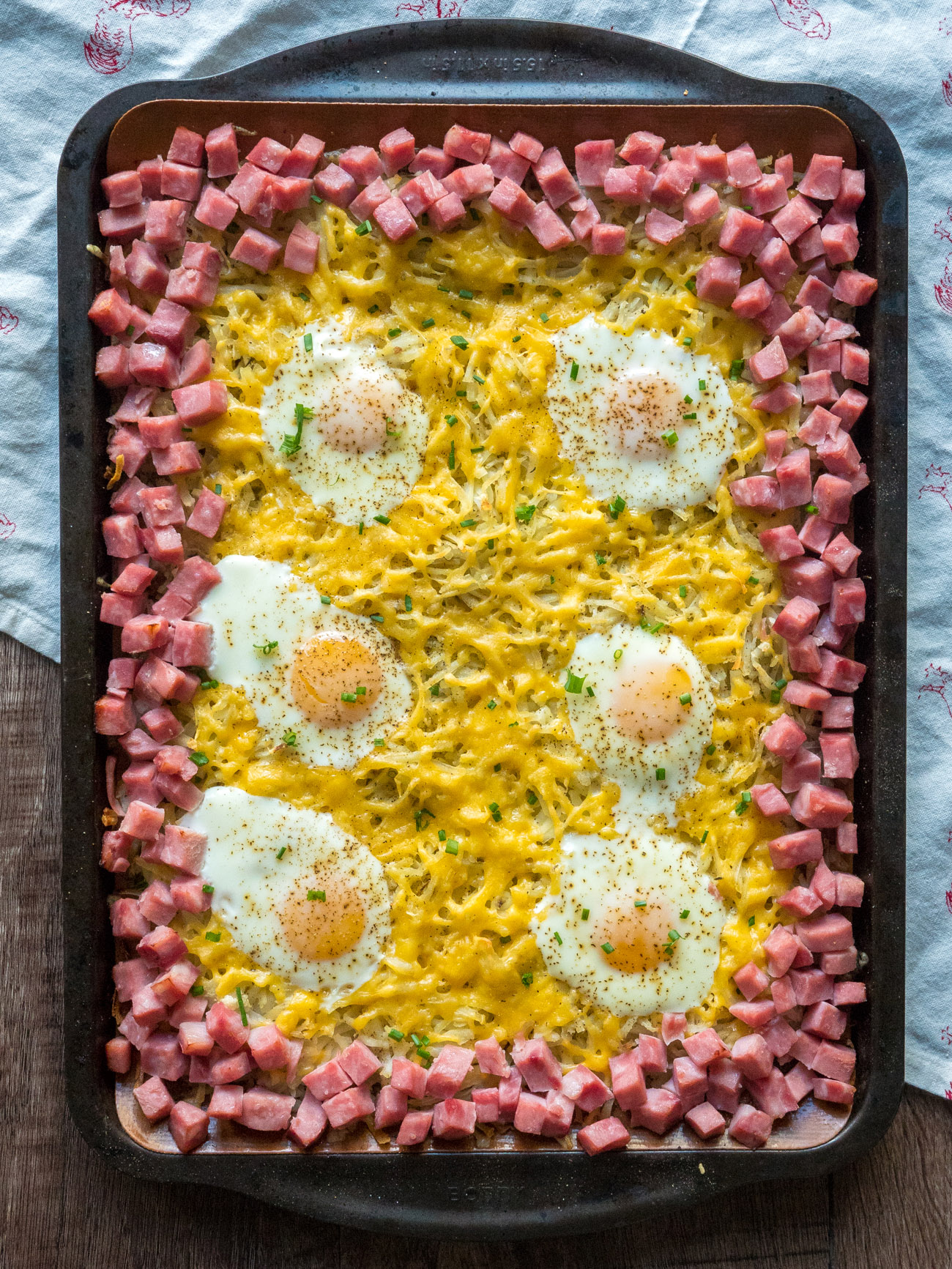 https://cdn.greatlifepublishing.net/wp-content/uploads/sites/2/2020/04/13133402/Sheet-Pan-Hashbrown-Breakfast-Bake-Vertical-11.jpg