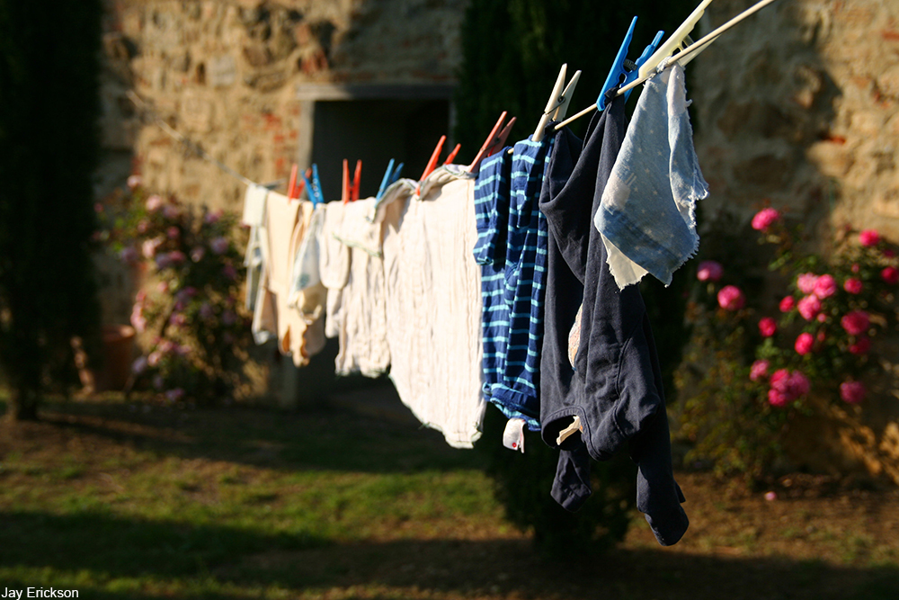 clothes and rags neatly hung on clothesline