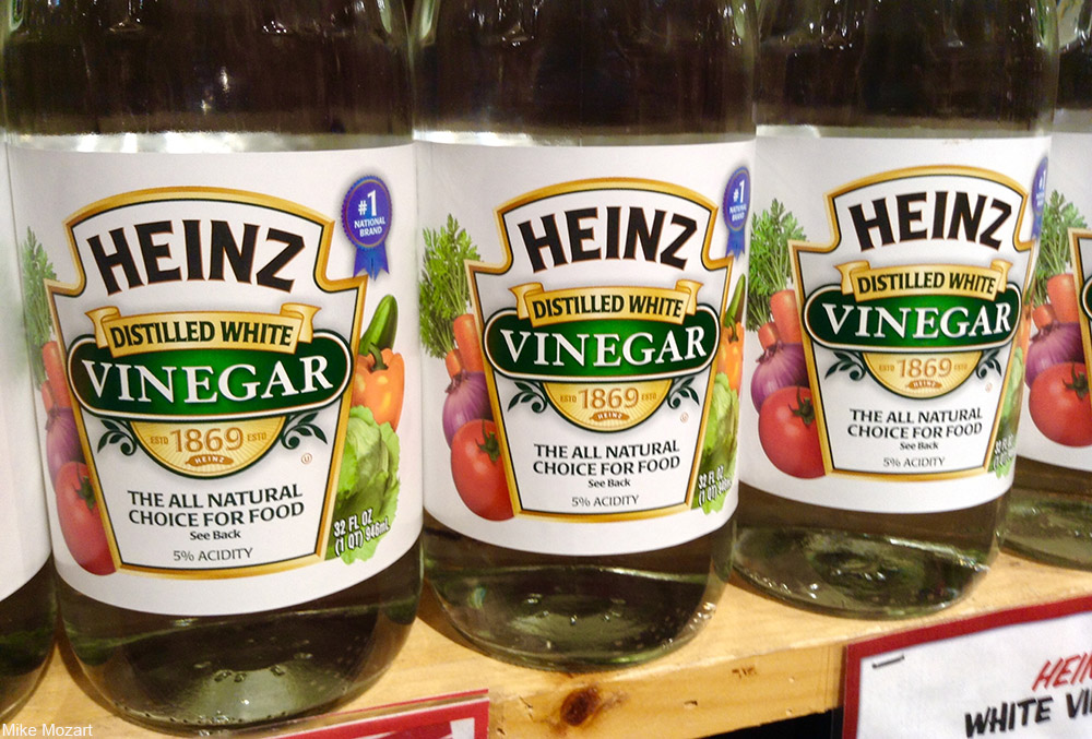 bottles of vinegar on store shelves