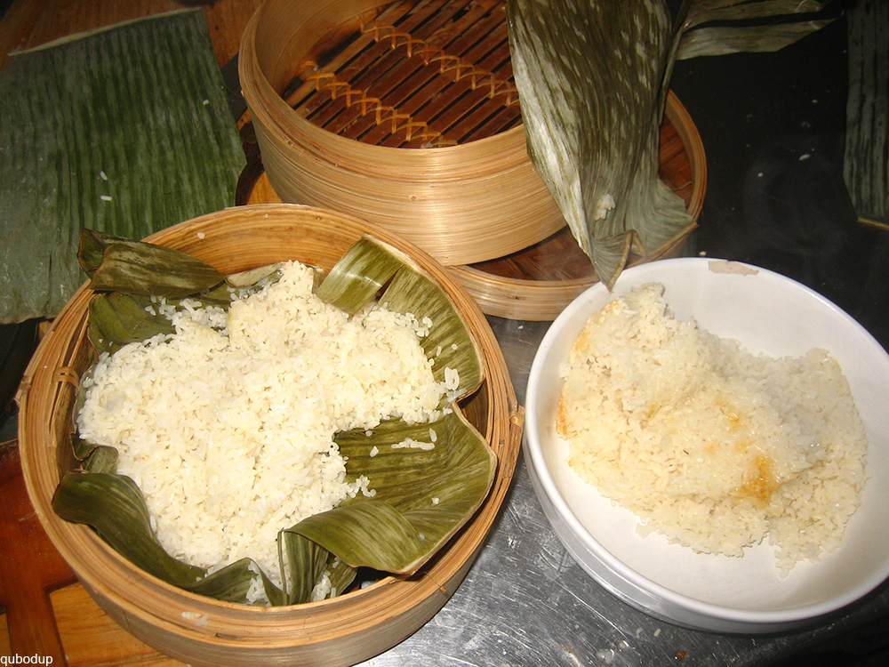 sticky rice in a bamboo steamer