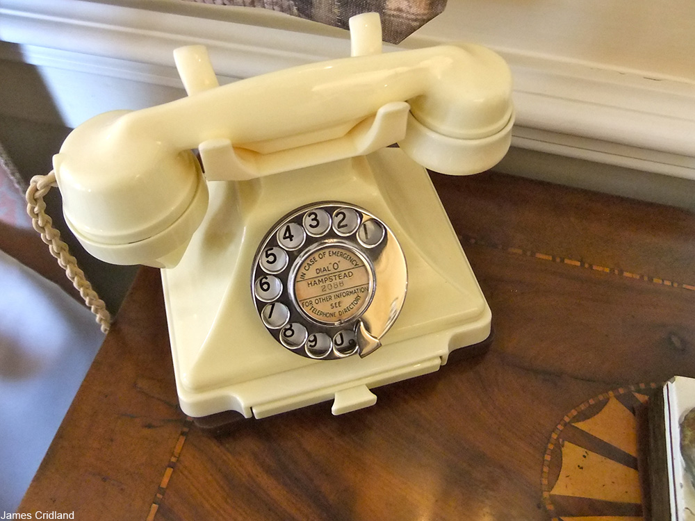 vintage phone with built-in drawer for notes or addresses