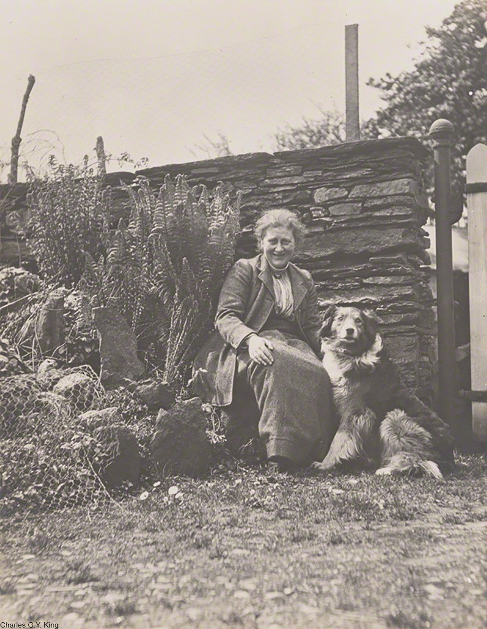 Beatrix Potter and her dog at Hill Top famr