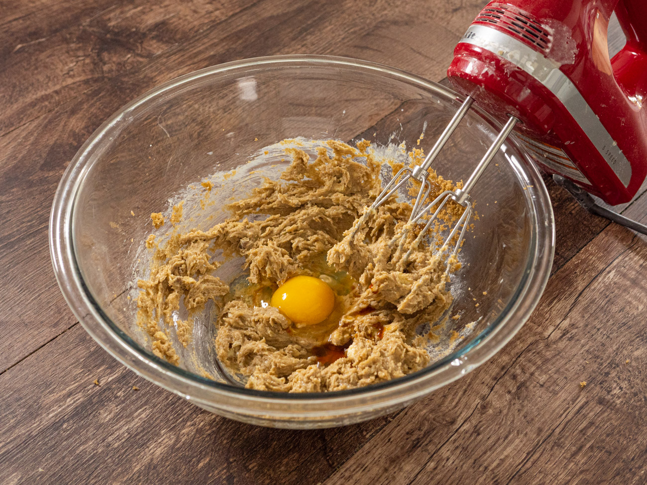 For the outer cookie dough cream together butter and sugar in a large bowl. Add in vanilla and egg and incorporate well.