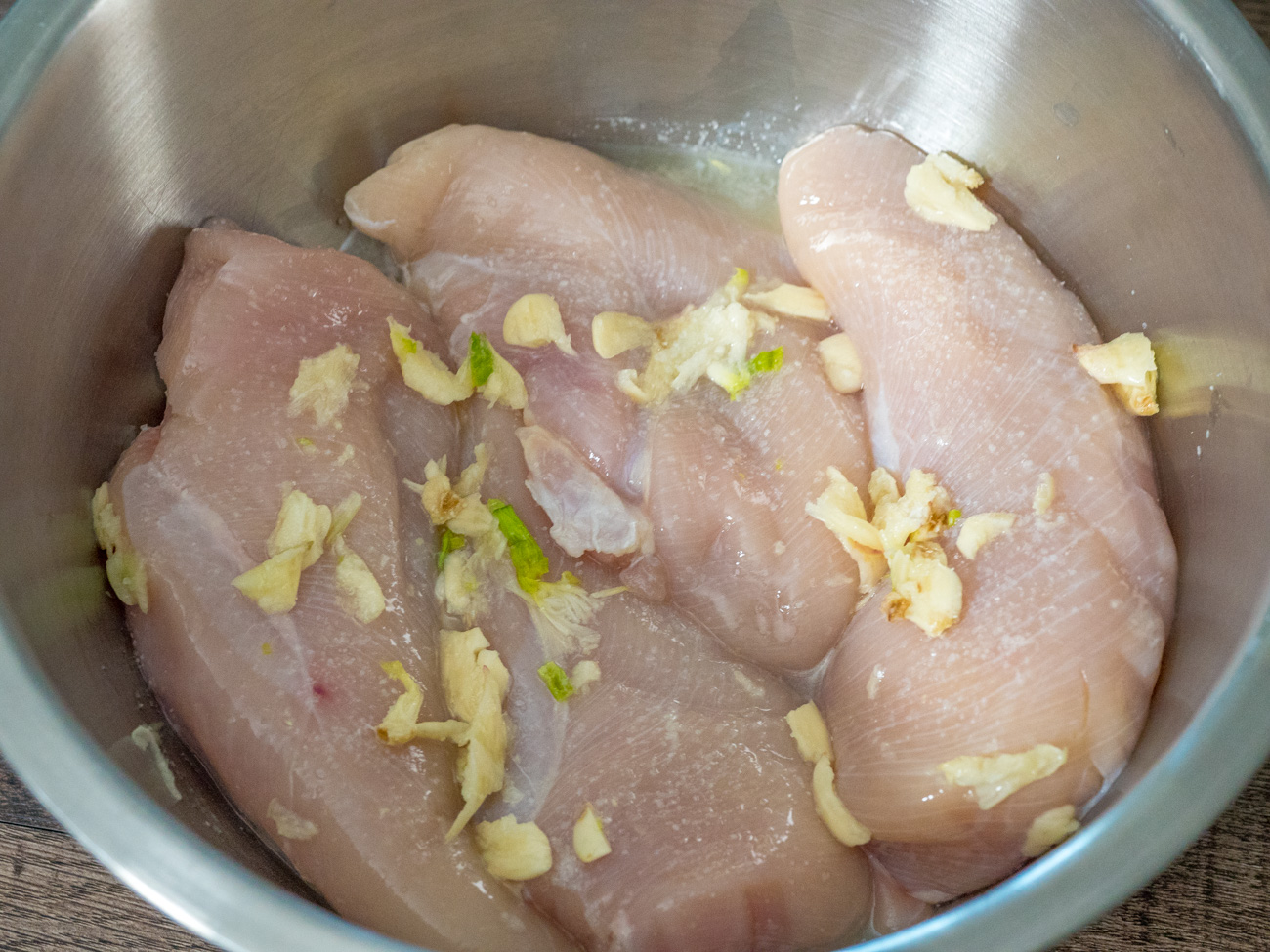 Combine garlic and lemon for the marinade. Pour over chicken to coat and sprinkle with salt. Marinate the chicken for 1-2 hours or overnight in the refrigerator.