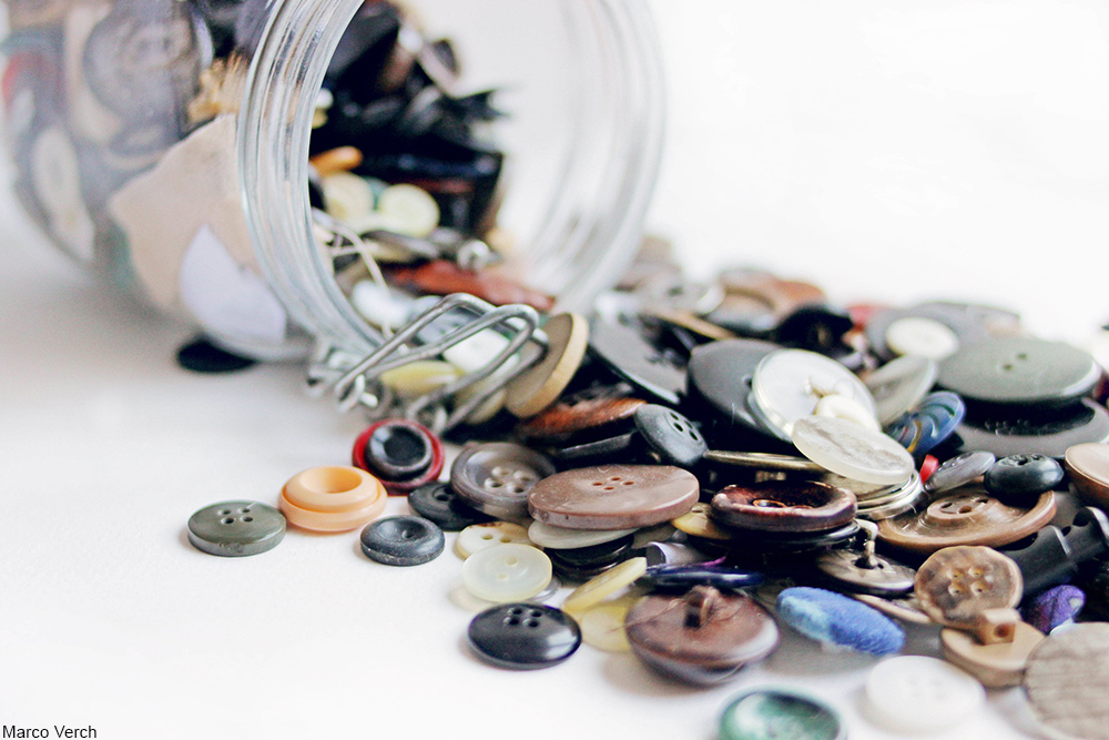 jar of spilled buttons