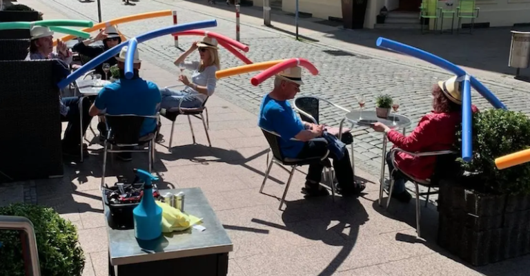 A Café In Germany Gave Their Customers Pool Noodle Hats To Enforce Social Distancing