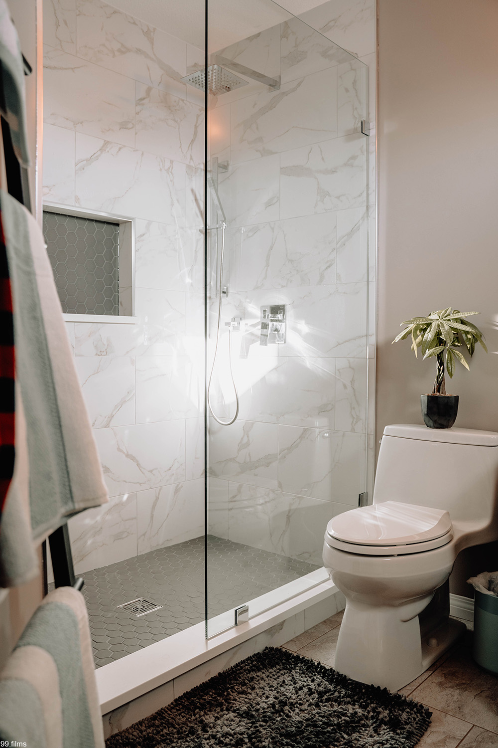 bathroom with glass shower surround