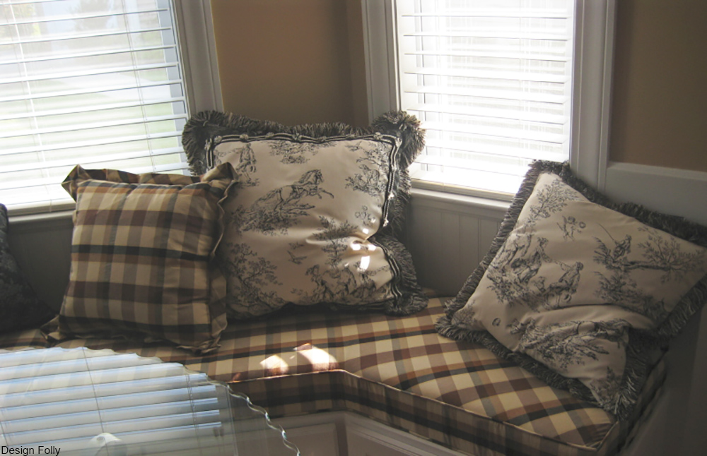 toile pillows in a modern day window seat