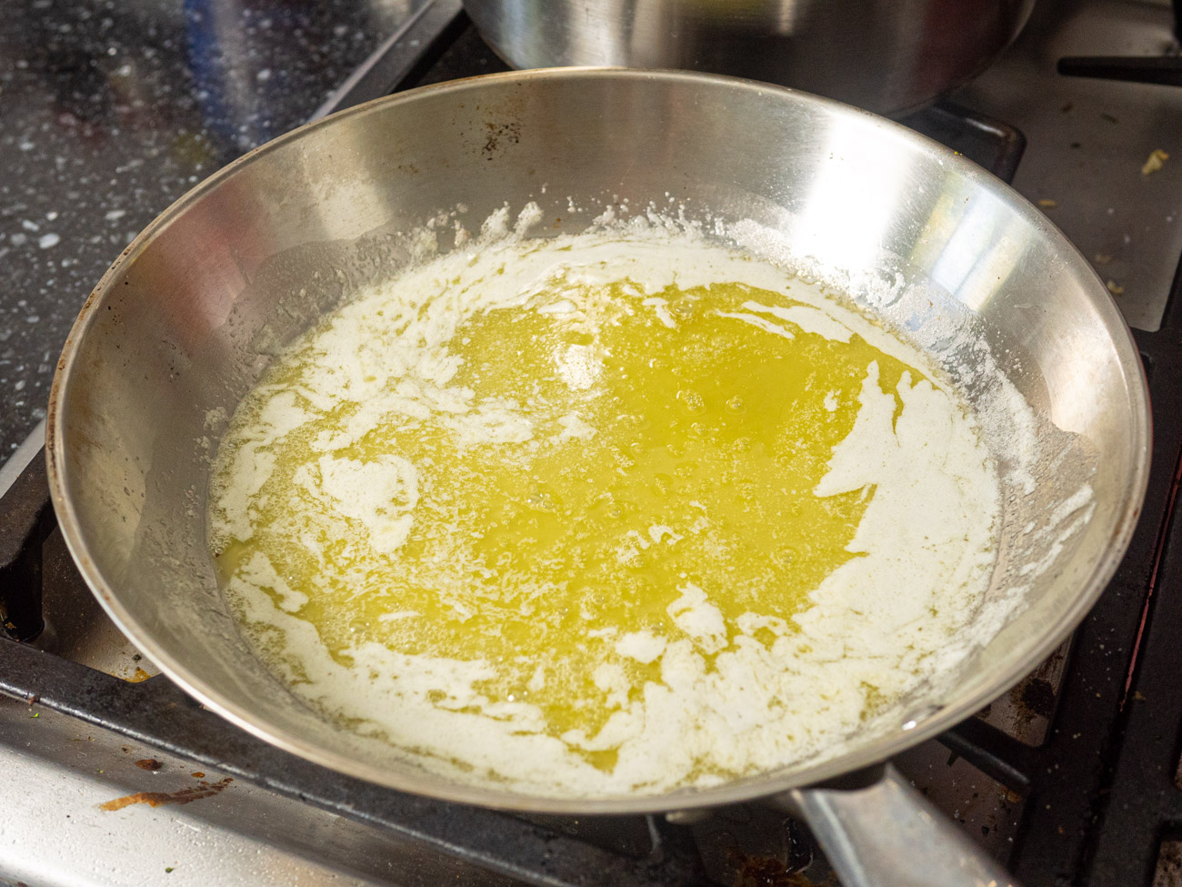 Melt butter in a saucepan over medium heat. Stir every 30 seconds or so until the butter has turned the color of caramel. This should take 3-5 minutes.