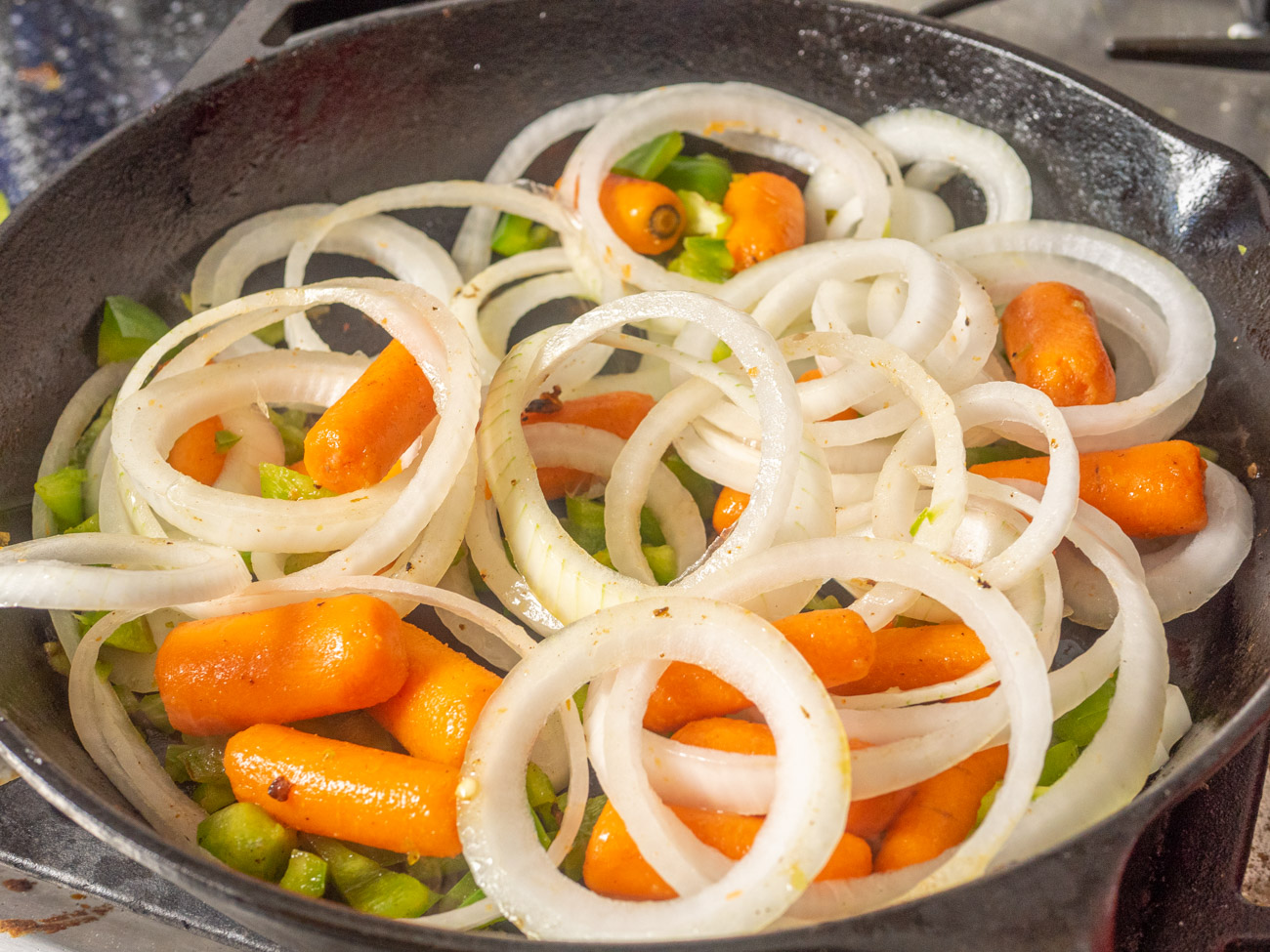 Cook remaining vegetables in the last tablespoon of olive oil for about 5-7 minutes. Add these to casserole dish.