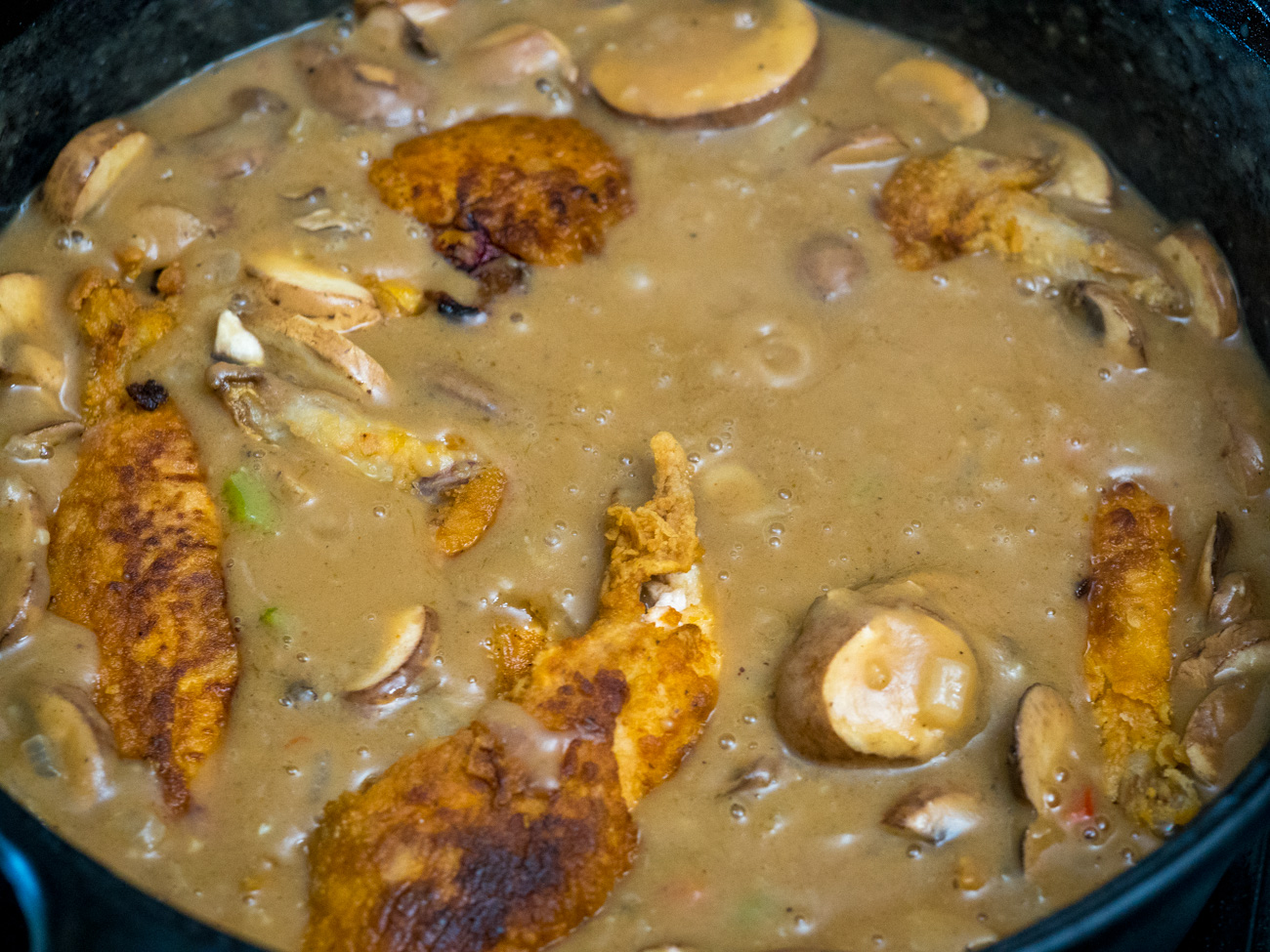 making Cajun Chicken Fricassee