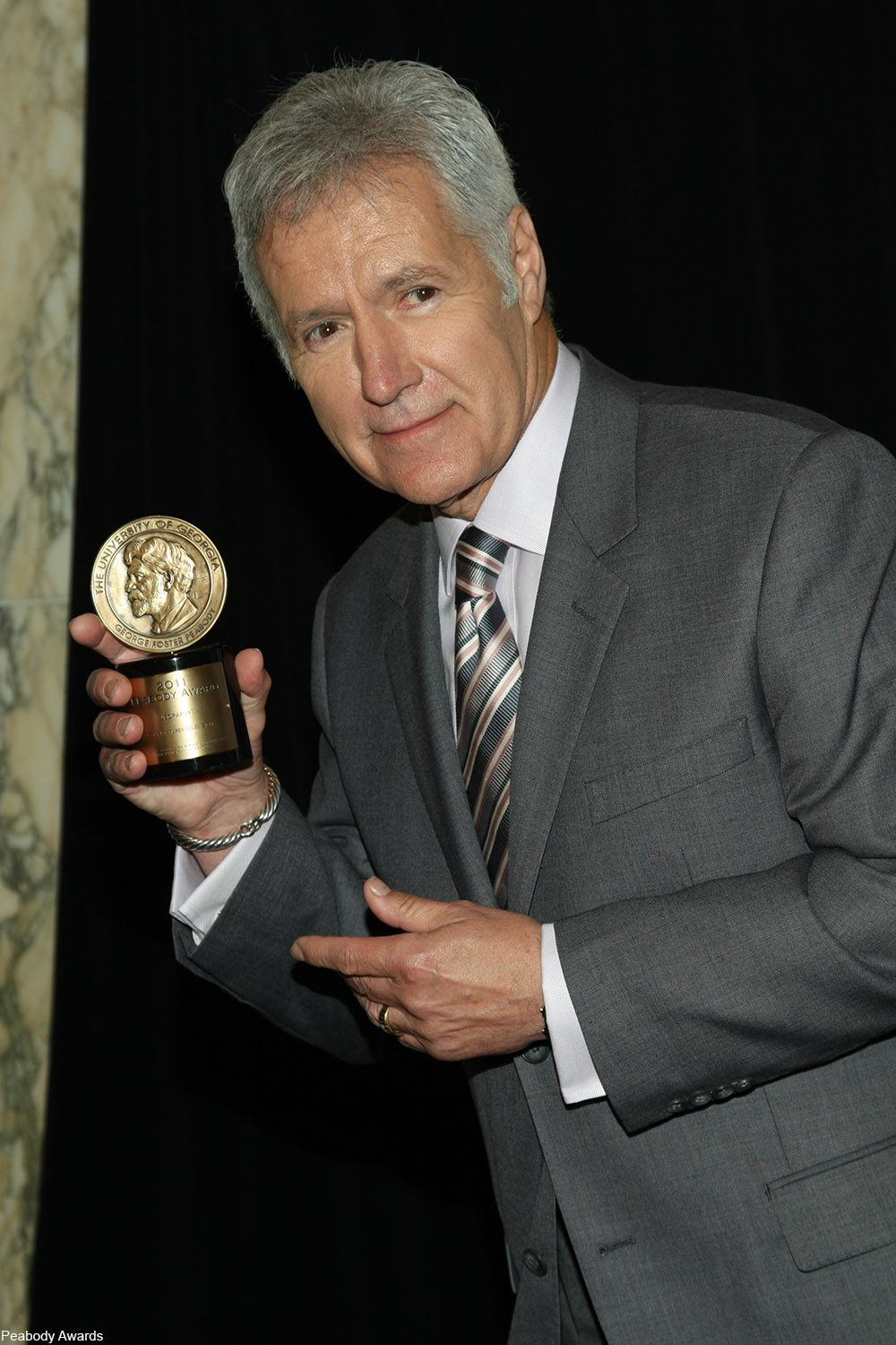 Alex Trebek receiving a Peabody Award in 2012