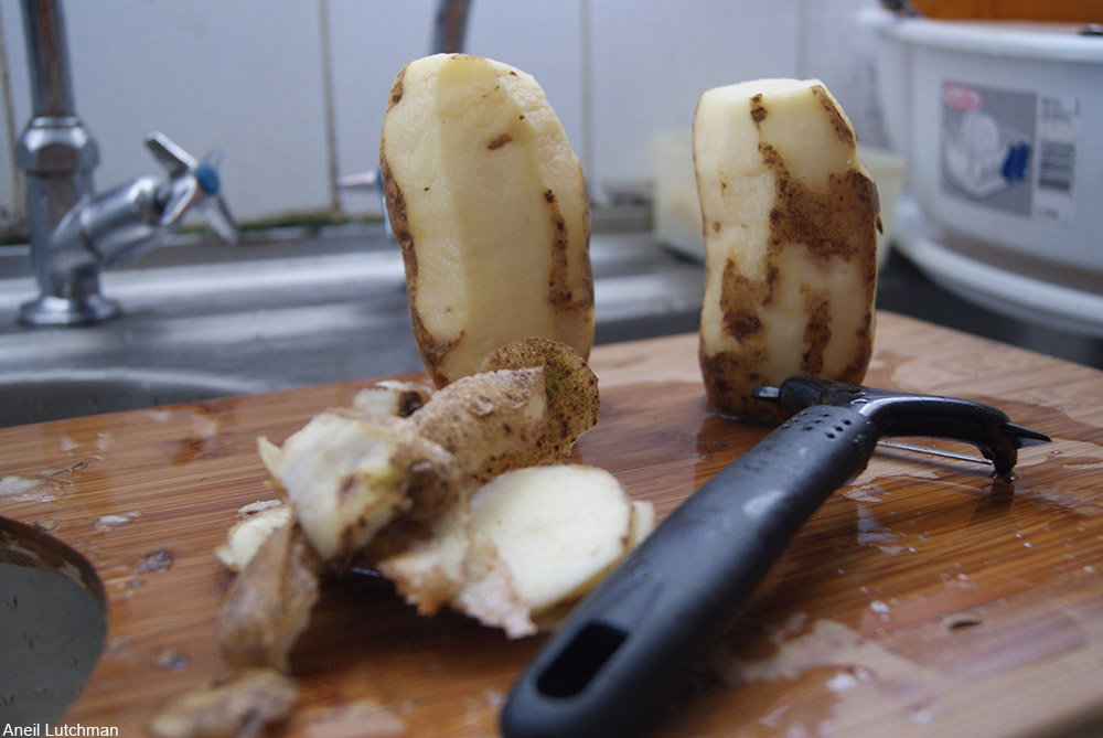 potatoes being peeled