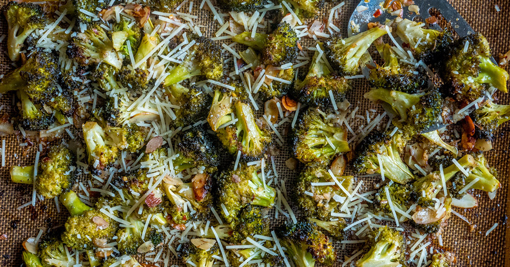 Remove from oven and sprinkle with grated parmesan cheese.