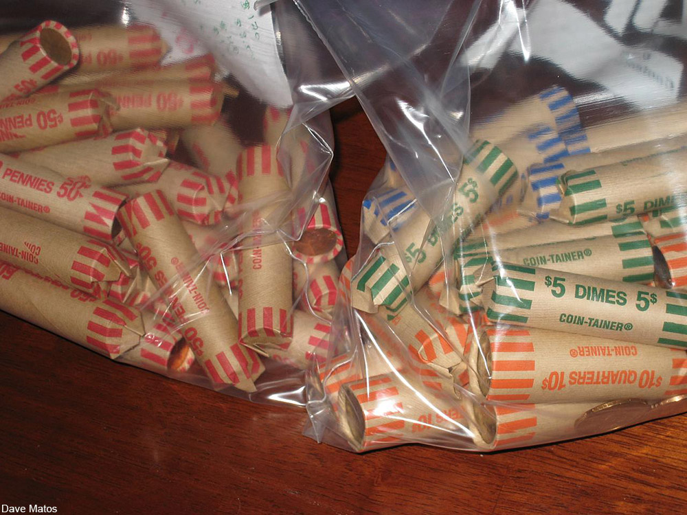clear baggies full of rolls of American coinage