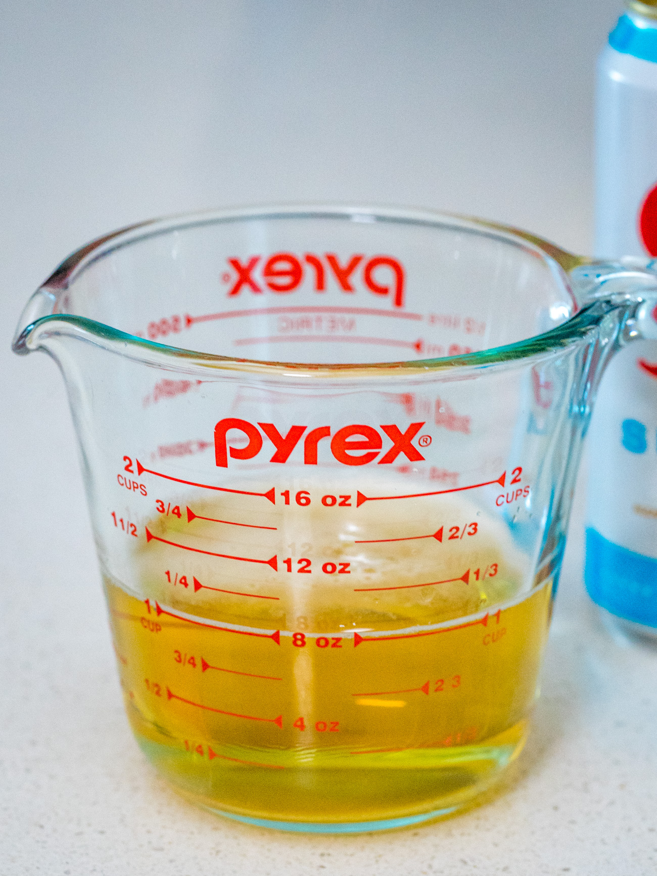 beer in a measuring cup