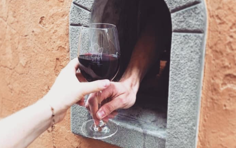 Medieval “Wine Windows” Reopen In Tuscany To Serve People Wine While Social Distancing