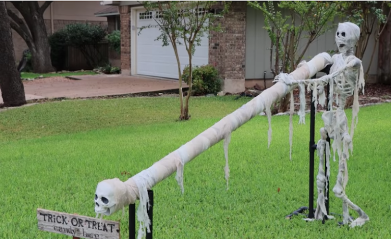 DIY Candy Slide Allows For Trick-Or-Treating While Social Distancing