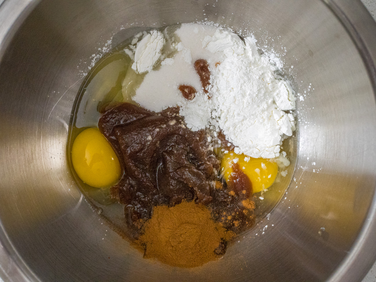 In a medium-sized bowl, beat eggs, sugar, cornstarch, cinnamon, and apple butter until thoroughly combined. Add milk and whisk together.