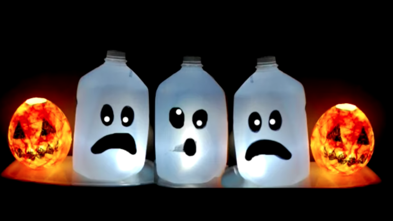 How To Make DIY Glowing Milk Jug Ghosts For Halloween
