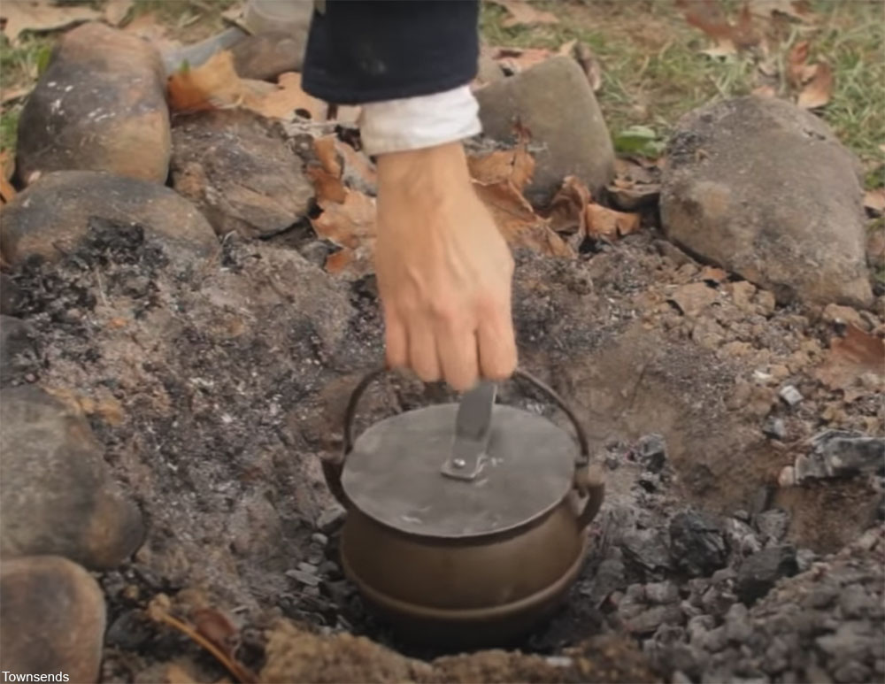 making baked beans in a cast iron pot