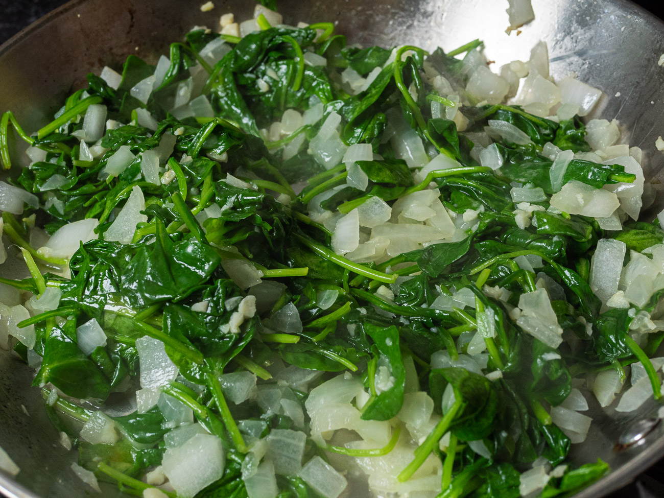 Add spinach and cook until wilted, 3-4 minutes. Season to taste with salt and pepper.