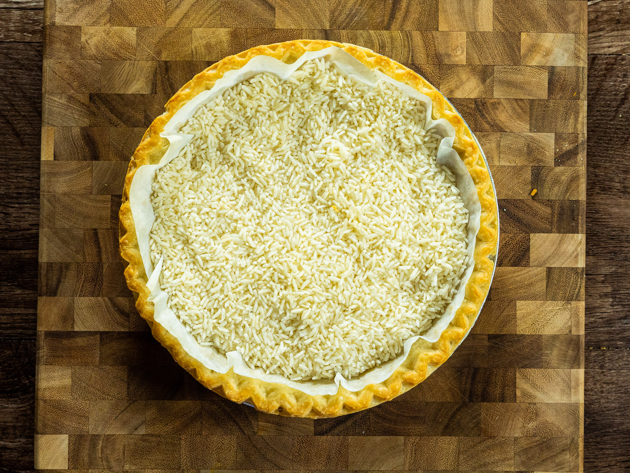 Preheat oven to 450˚F. Line pie shell with parchment paper and fill with pie weights or rice. Prebake pie crust for 8 minutes and then lower heat to 375˚ and bake for another 5-7 minutes.