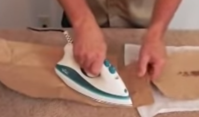Remove Candle Wax From Carpet With A Clothes Iron