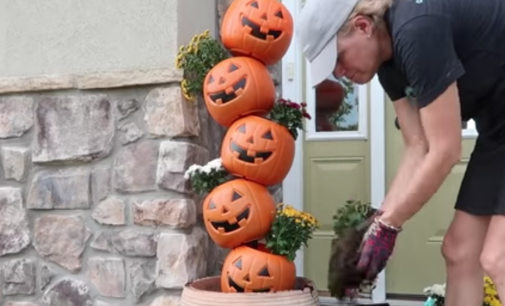 Turn $1 Plastic Pumpkins Into A Festive Fall Porch Decoration