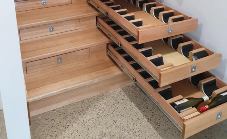 Builder Transforms The Wasted Space Inside Of A Staircase Into A Wine Cellar