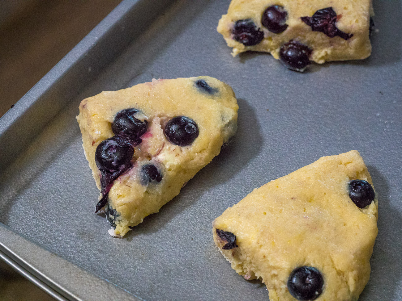 Place scones on greased or lined baking sheet 2-3 inches apart and refrigerate for 15 minutes. Preheat oven to 400˚F.