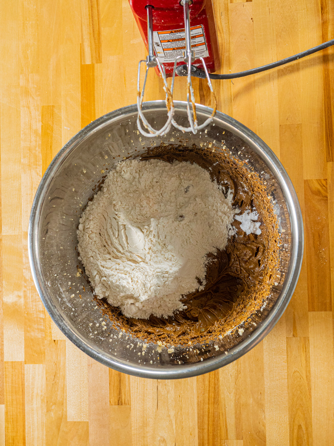 Stir in remaining ingredients and mix until dry ingredients are just combined.