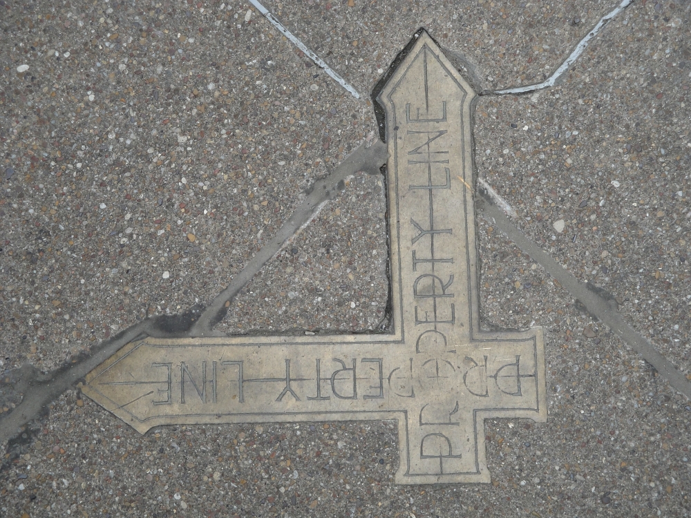 property line demarkation on sidewalk, Dallas