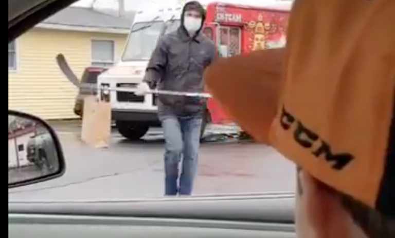 Canadian Food Truck Vendor Uses A Hockey Stick To Deliver Poutine To Customers While Socially Distancing