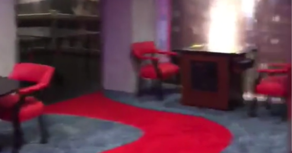 Woman Pulls A Hidden Lever And Her Fireplace Moves To Reveal A Comic-Book Themed Secret Room