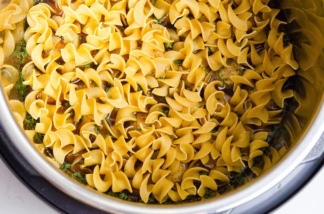 Add noodles on top in an even layer and gently press down, do not stir.