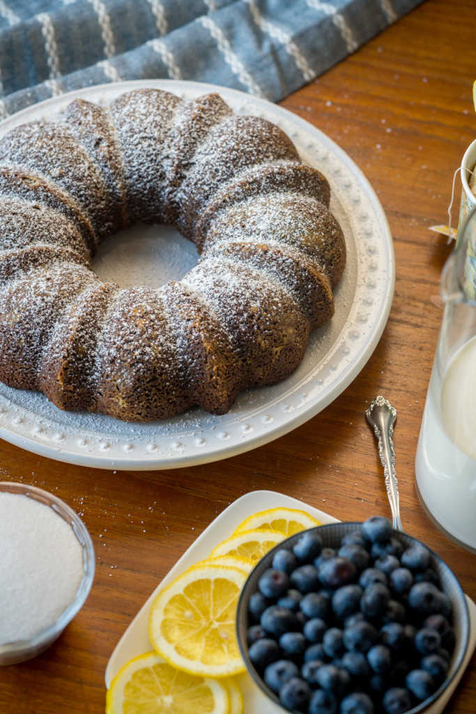 Top down view of budnt cake with powdered sugar on top