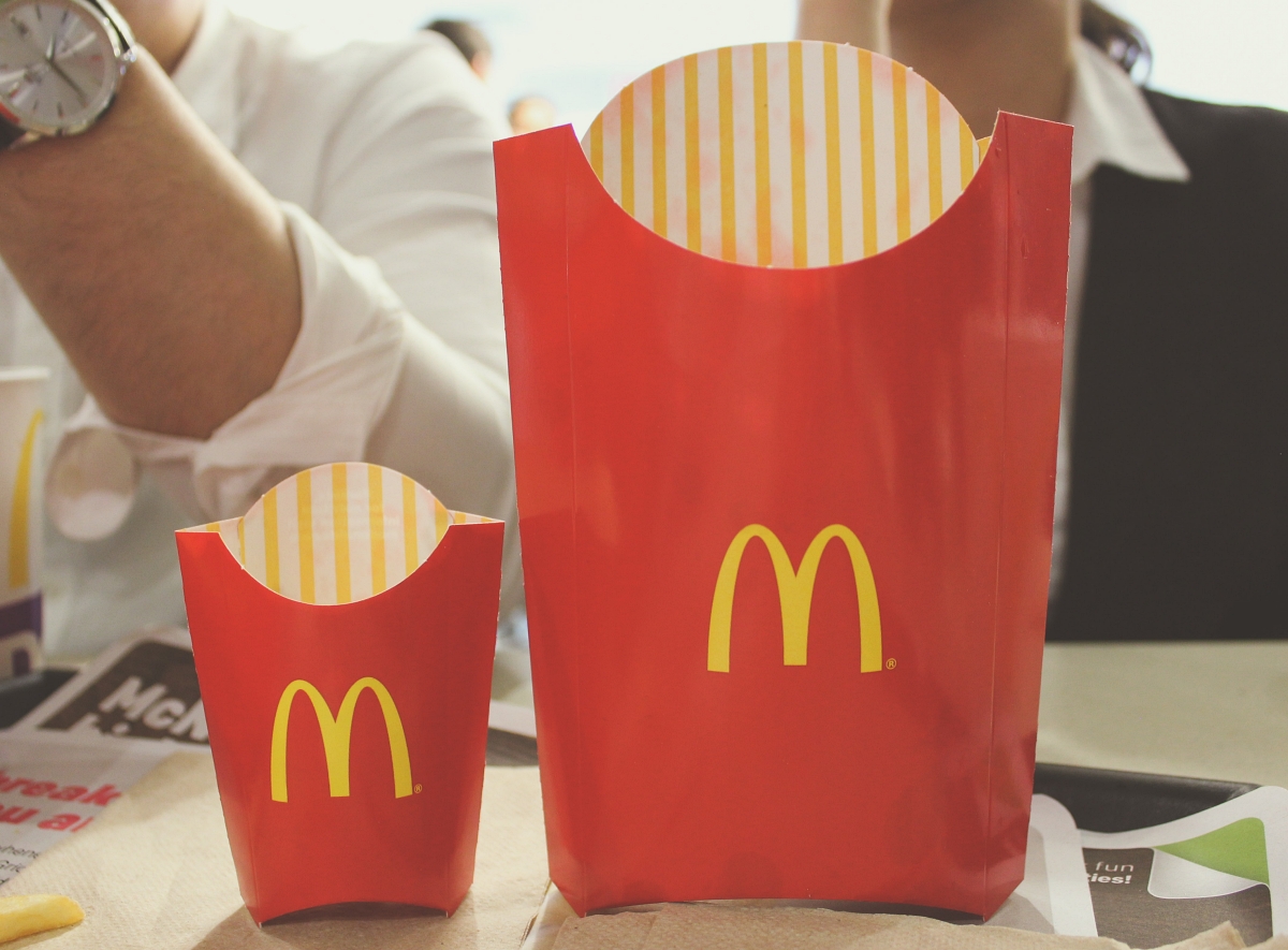 two very different sizes of McDonald's fried side by side