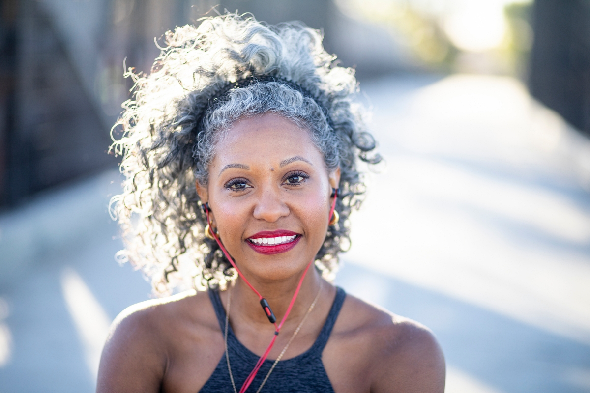 woman with silver hair and red lipstick