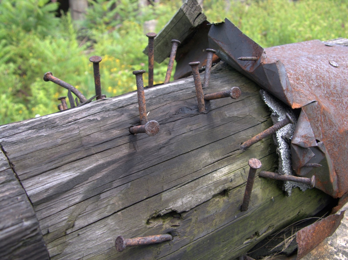 rusty nails sticking out of wood