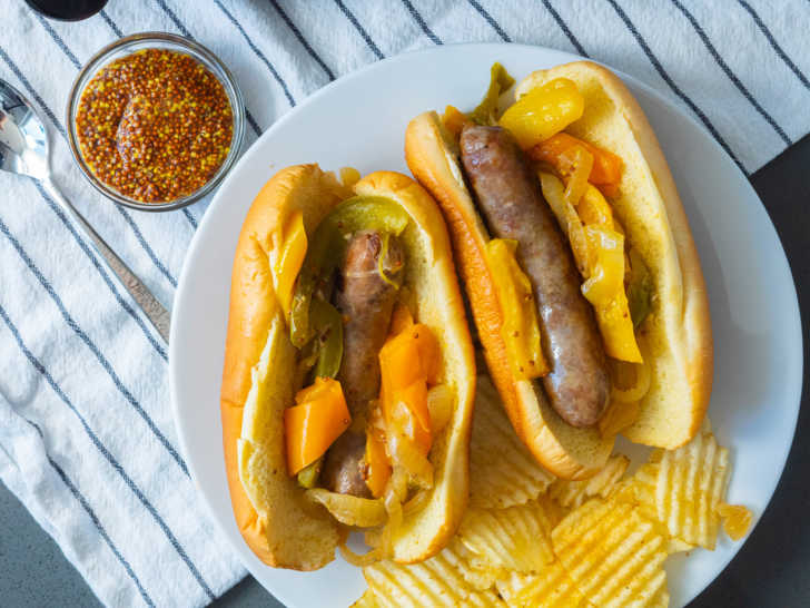 Slow Cooker Brats with Onions and Peppers - Cooking With Carlee