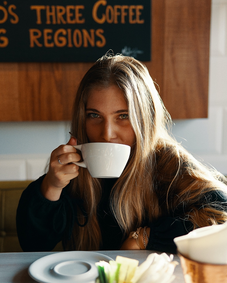 young woman drinking coffee