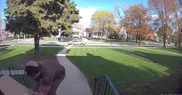 Doorbell Cam Catches A UPS Driver Saving Kid Trapped Under A Heavy Package