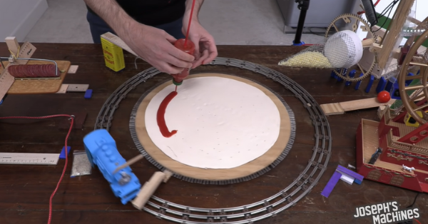 Man Creates Pizza Machine Powered By A Toy Train